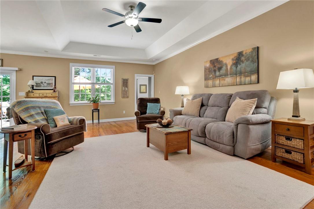 Image 2: Warm and inviting, this room offers comfort and st