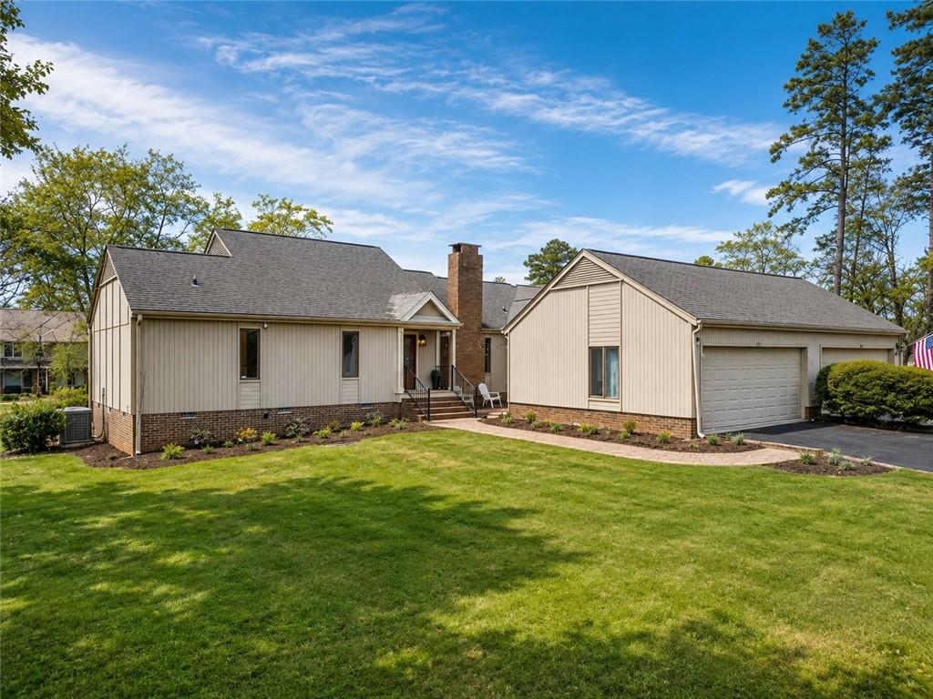 Image 3: A gracefully designed residence with a brick facad