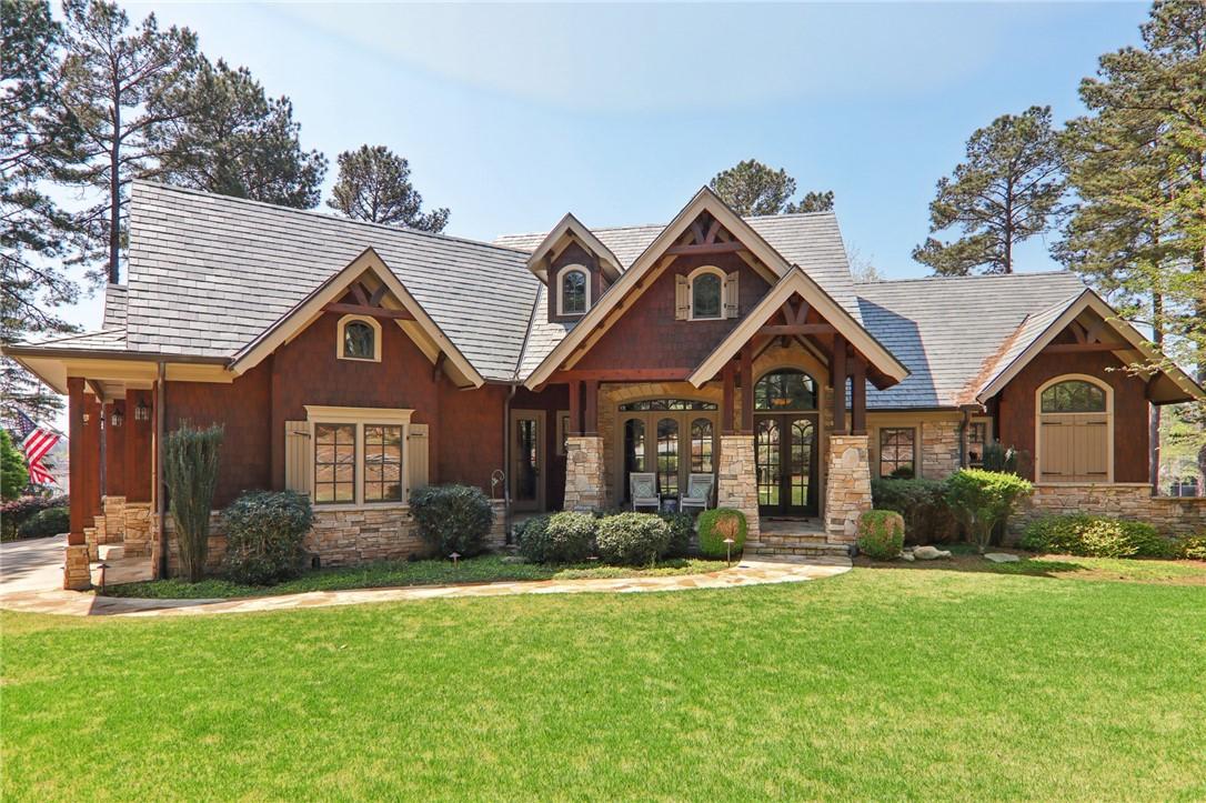 Image 1: This charming home offers a perfect blend of natur