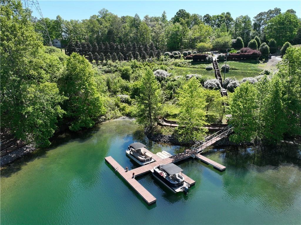 Image 2: This serene waterfront property offers direct lake