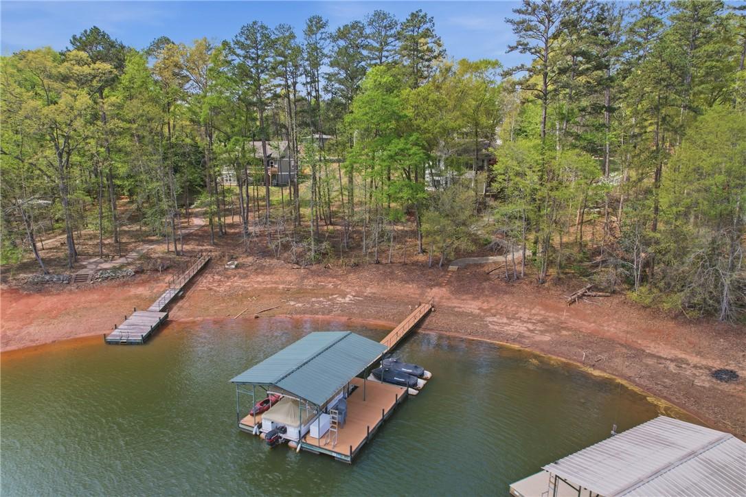 Image 2: This serene lakeside property boasts private dock