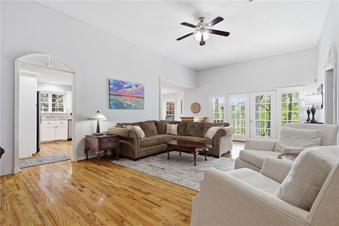 Image 3: This bright living area features abundant natural