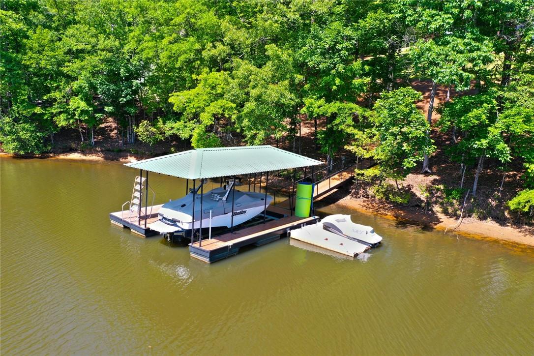 Image 2: This serene lakefront property includes a private