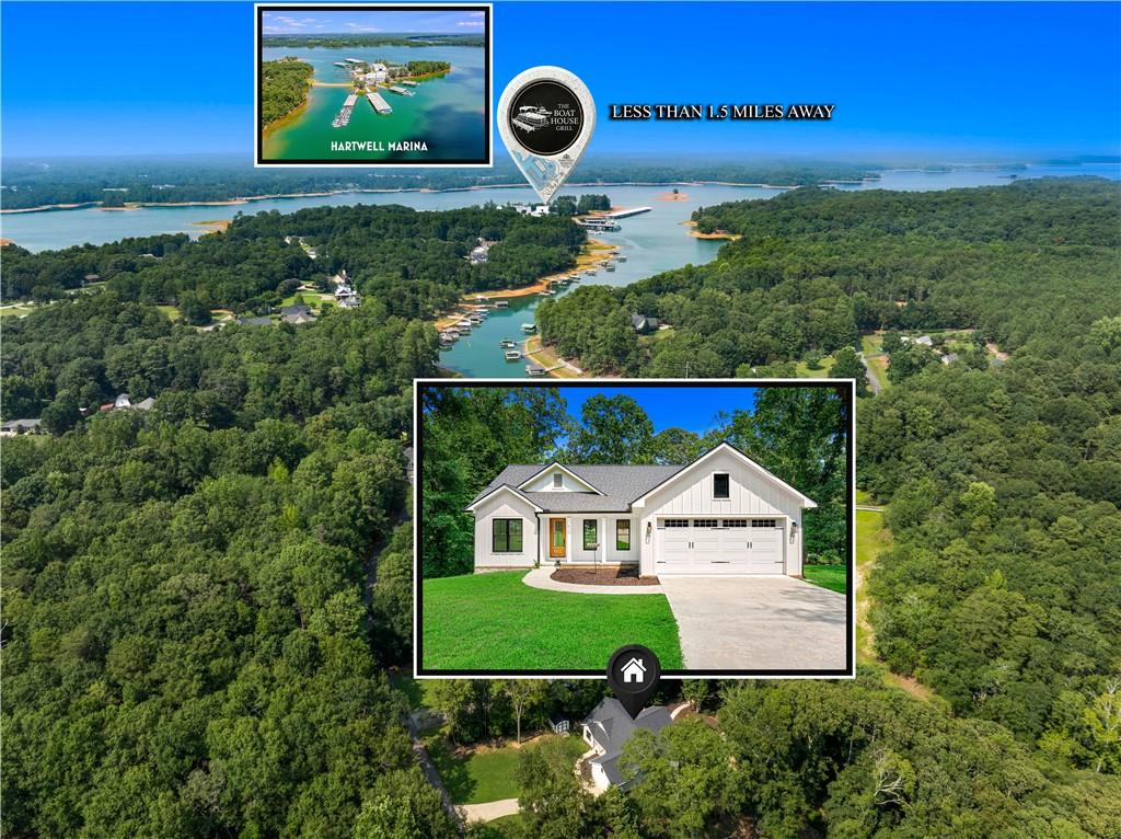 Image 1: An aerial perspective showcases a new residence ne