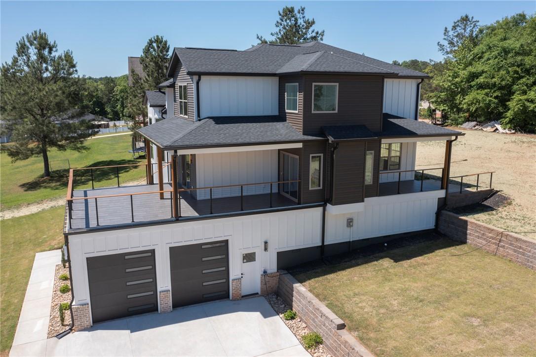 Image 2: This newly constructed residence showcases a seaml