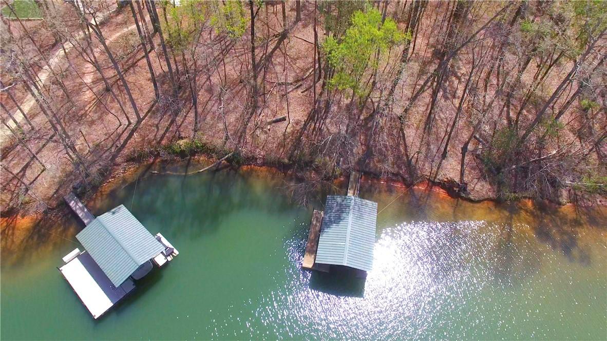 Image 2: This aerial view showcases serene waterfront livin