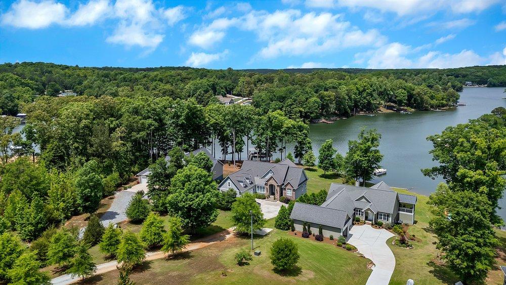 Image 2: This expansive lakefront property offers serene vi