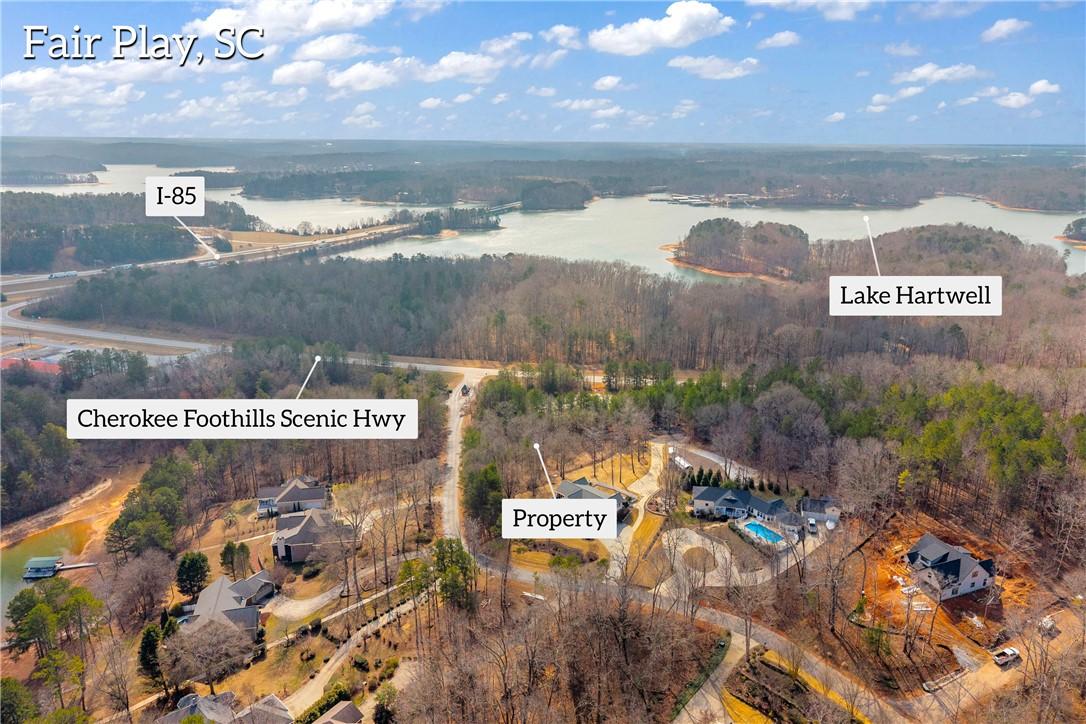 Image 4: An aerial view showcases a property near Lake Hart