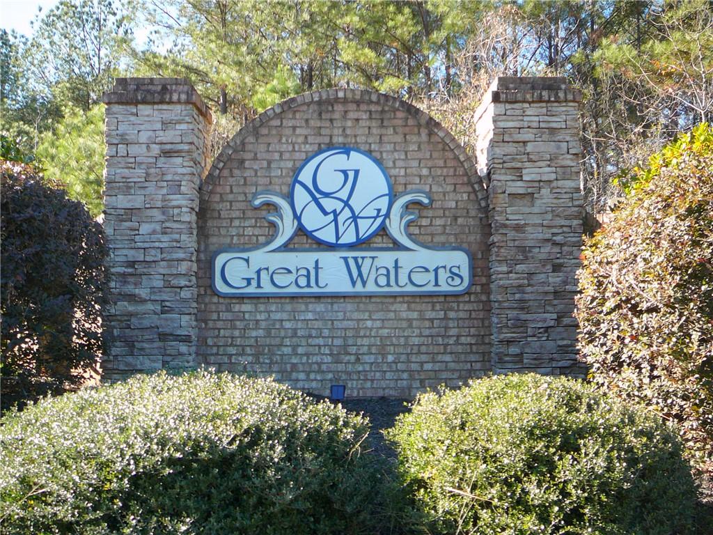 Image 3: A stone and brick entryway welcomes residents and