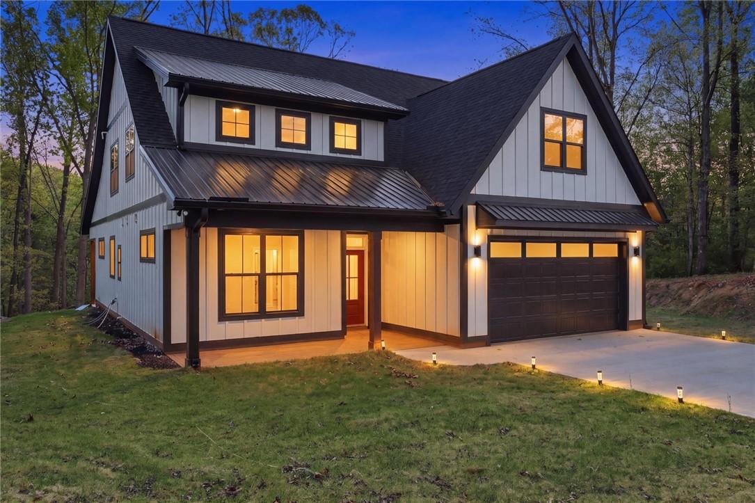 Image 3: This newly constructed home boasts modern farmhous