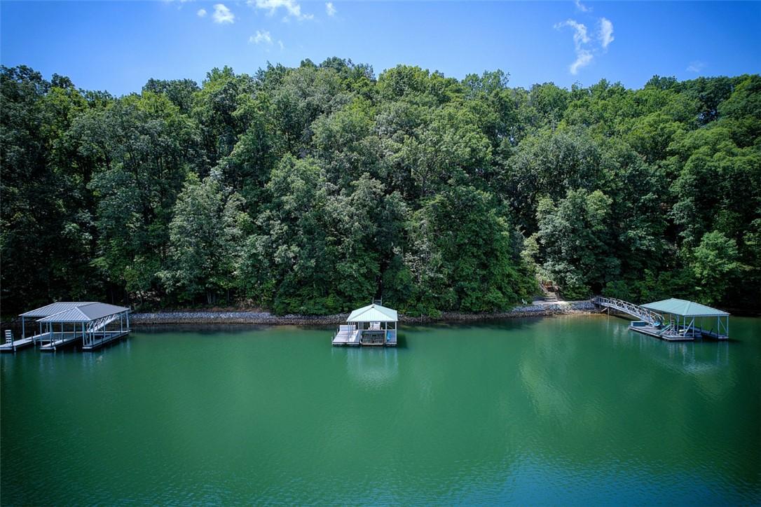 Image 3: This tranquil waterfront property offers serene la
