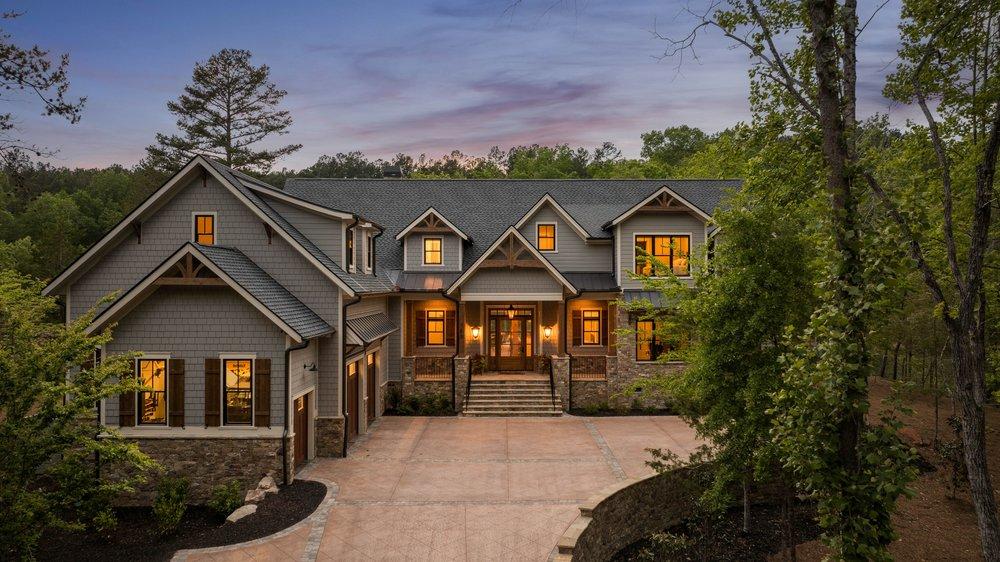 Image 1: This spacious property presents a grand exterior,