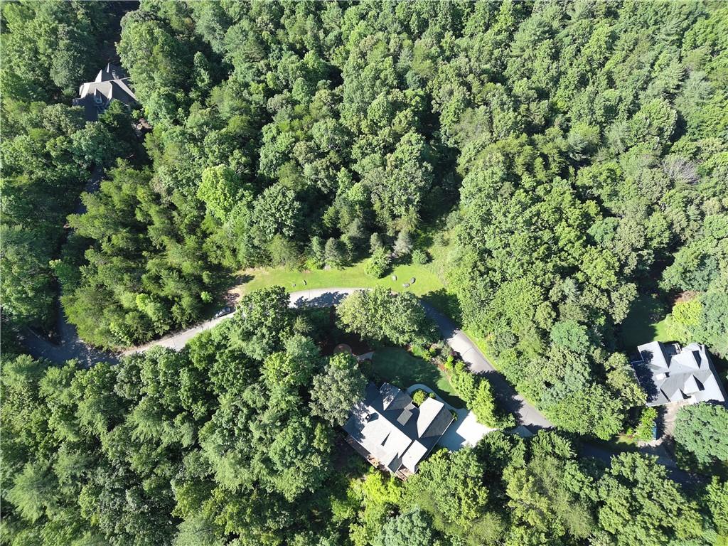 Image 4: Perched amidst a verdant landscape, this private e