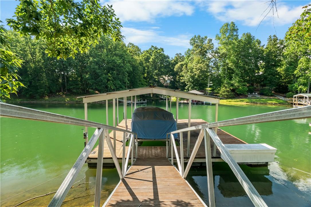 Image 2: Boasting direct lake access with a private boat do