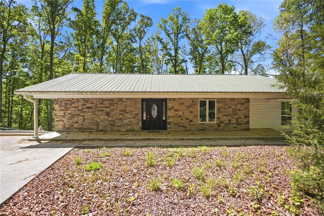 Image 2: This charming home offers a perfect blend of natur