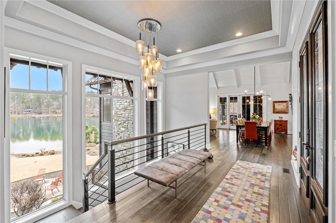 Image 3: This exquisite home offers an open floor plan and