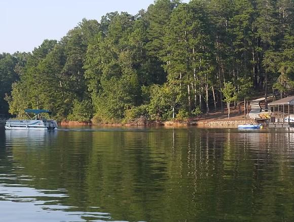 Image 3: This tranquil waterfront property offers serene la