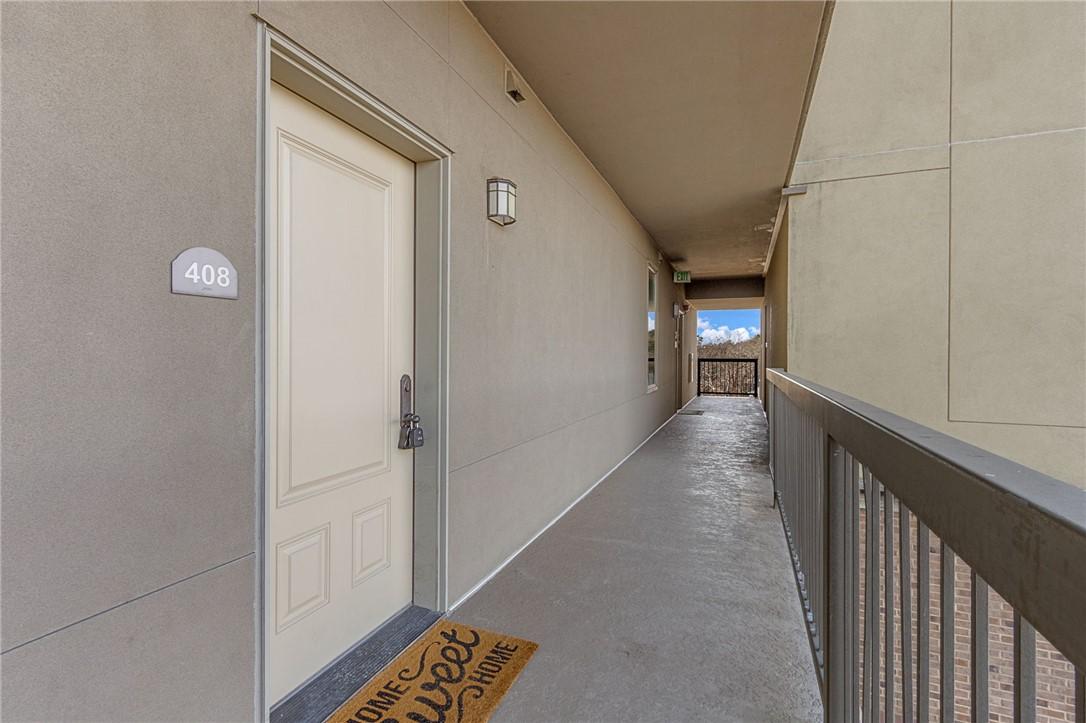 Image 3: An inviting entry to this residence, featuring a s