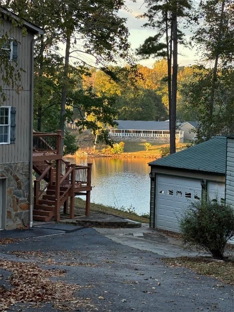 Image 1: This tranquil waterfront property offers picturesq