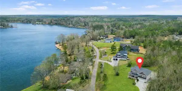 Image 2: This aerial perspective showcases a vibrant lake c