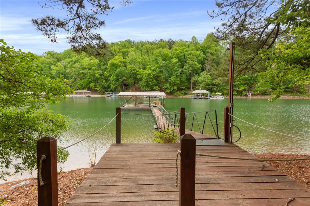 Image 2: Enjoy direct lake access from this charming proper