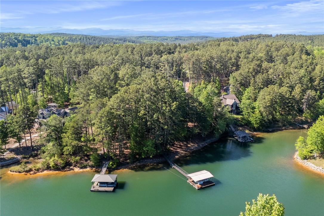 Image 3: This serene waterfront property offers tranquil la