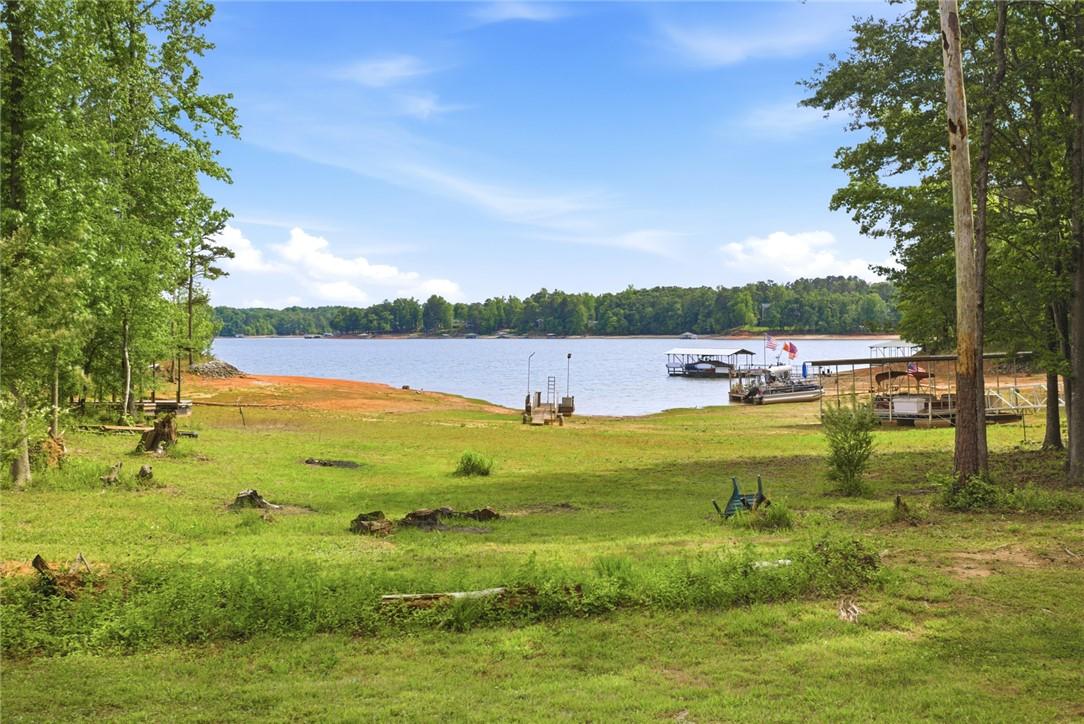 Image 3: This tranquil waterfront property offers expansive