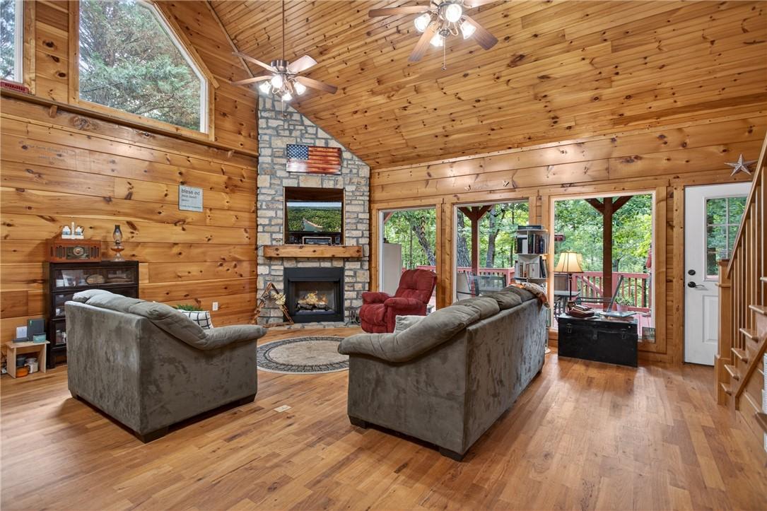 Image 2: A striking stone fireplace anchors this living spa