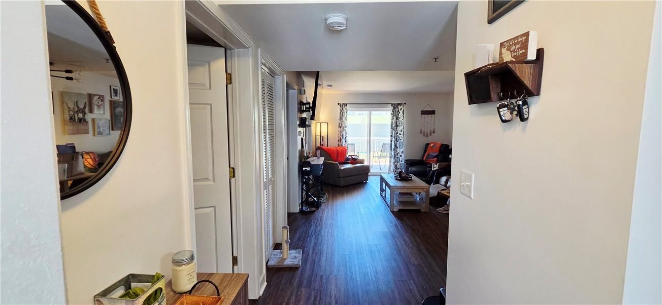 Image 4: This inviting entryway seamlessly transitions into