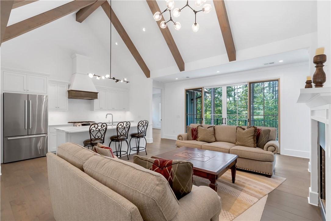 Image 2: Light and Bright open Living Area and Kitchen