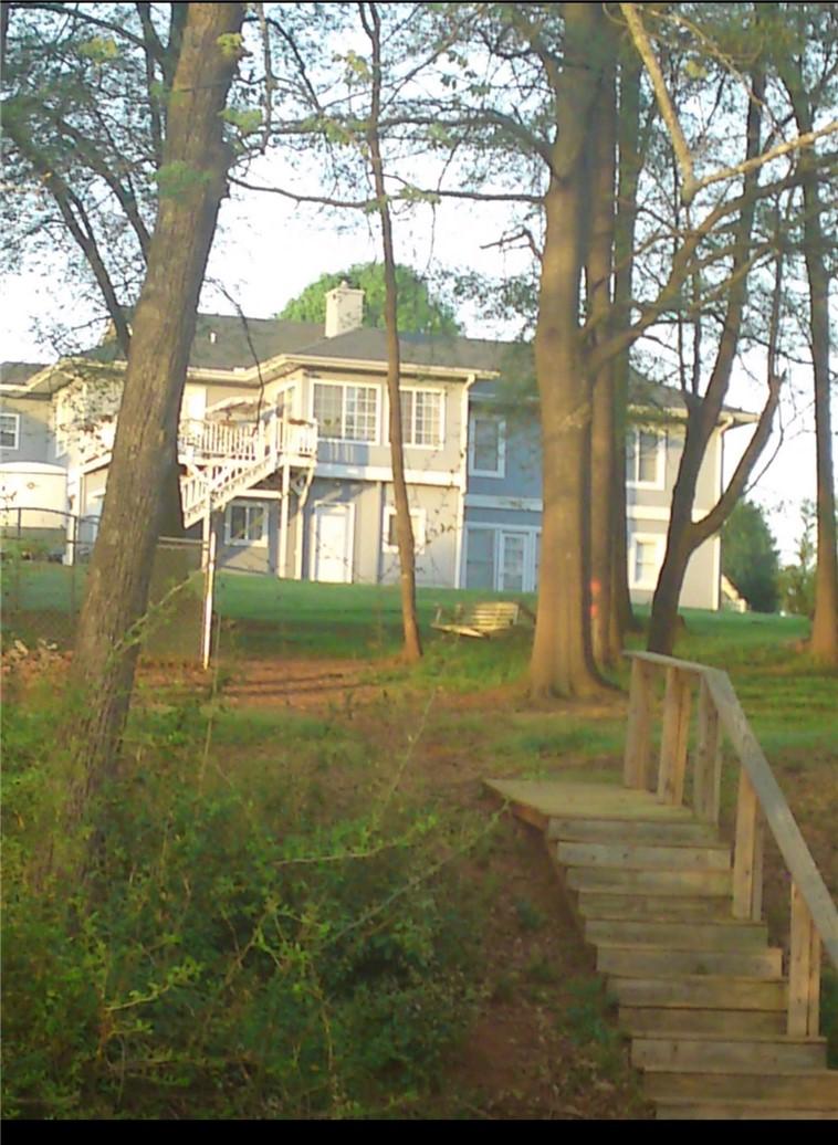 Image 3: Rear of lake home.
