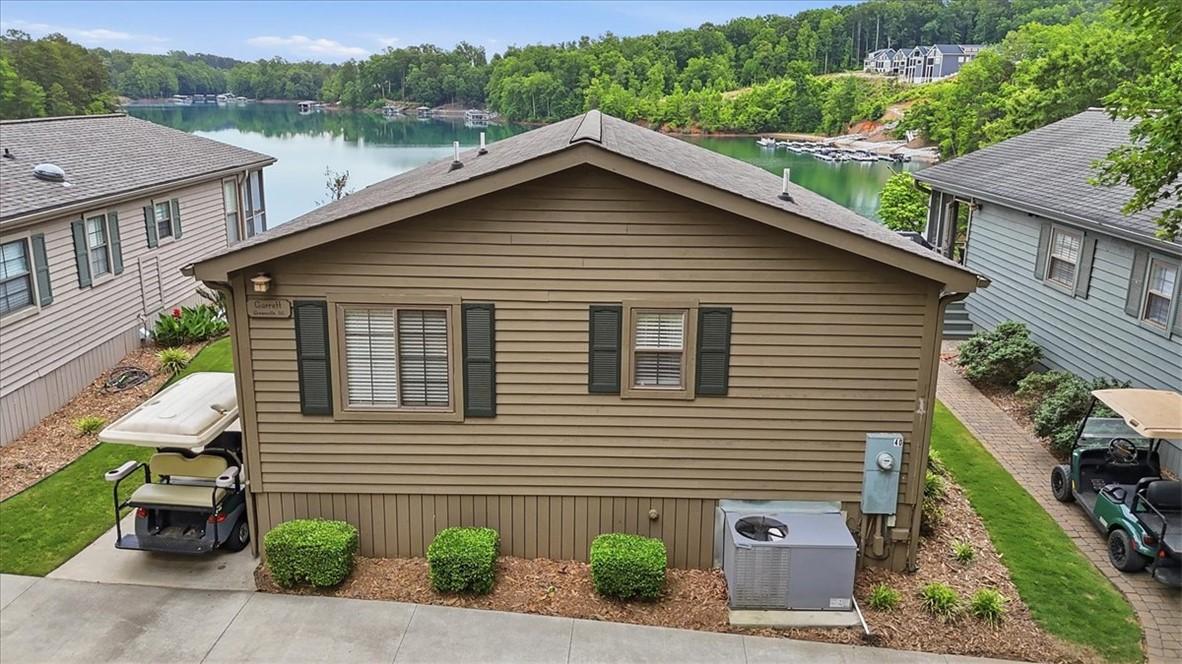 Image 1: Discover a charming lakeside retreat with pictures