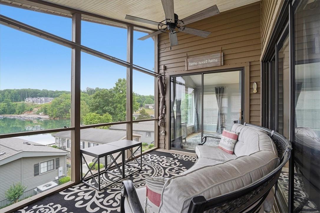 Image 4: Enjoy water vistas from this enclosed porch, featu