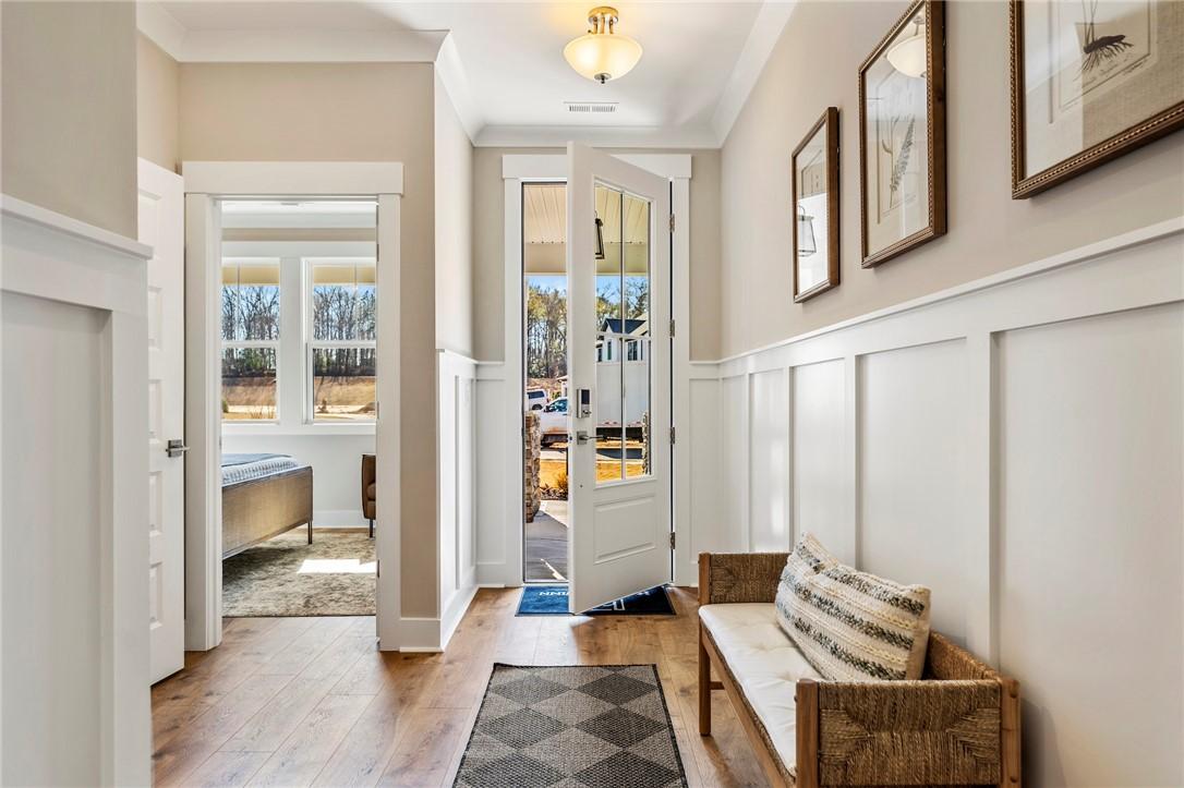 Image 3: Step inside this inviting entry featuring beautifu