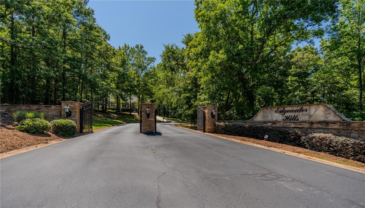 Image 3: A grand gated entrance welcomes residents into thi