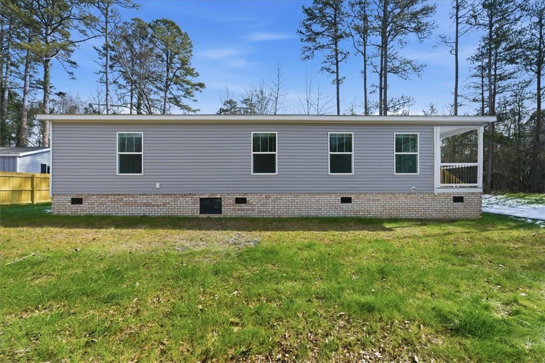 Image 2: This charming residence features a well-maintained
