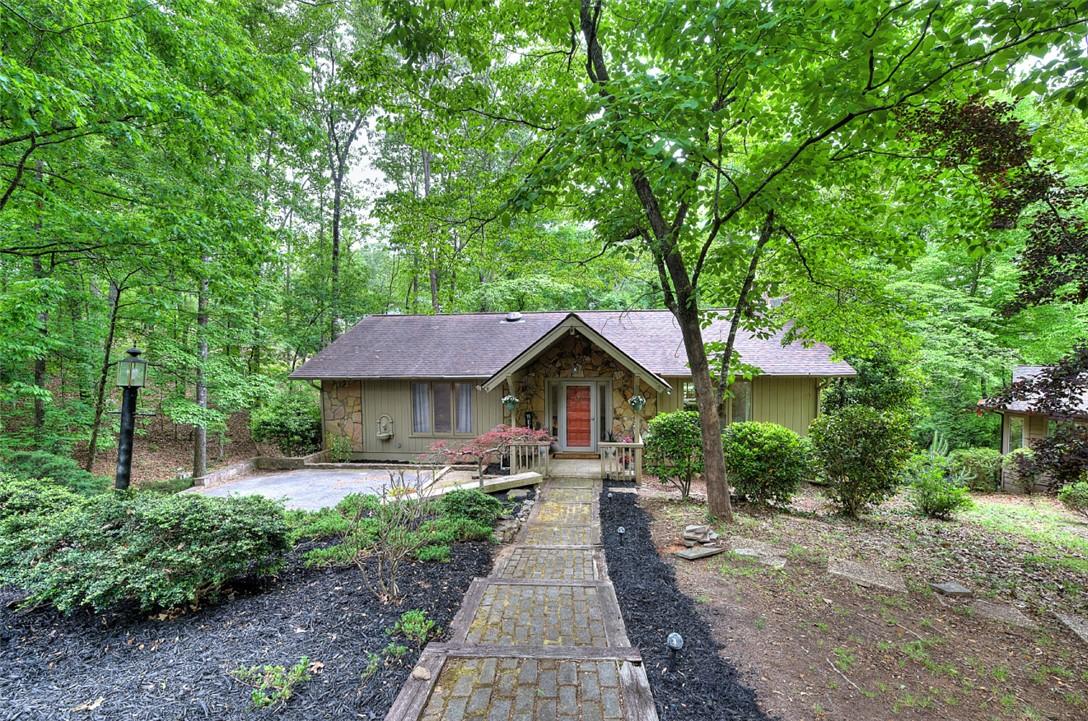 Image 1: Peaceful wooded surroundings