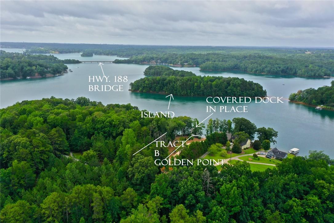 Image 4: An aerial perspective reveals a serene lakefront s