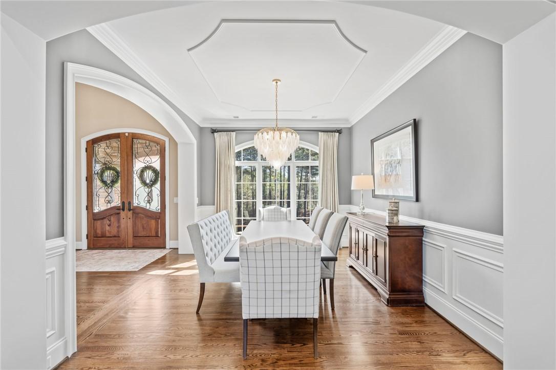 Image 2: This dining room is located right off the entry wi