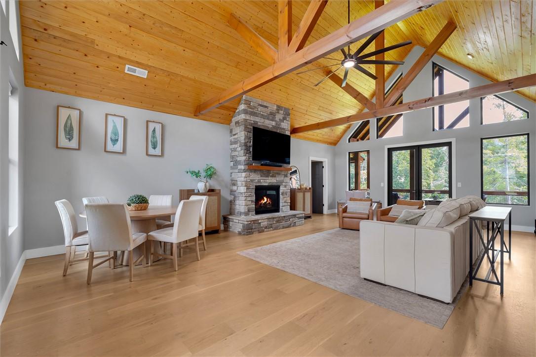 Image 3: Stunning Gas Fireplace with Floor to Ceiling Stone