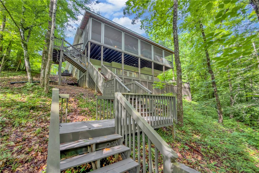 Image 1: Nestled in a verdant setting, a multi-level screen
