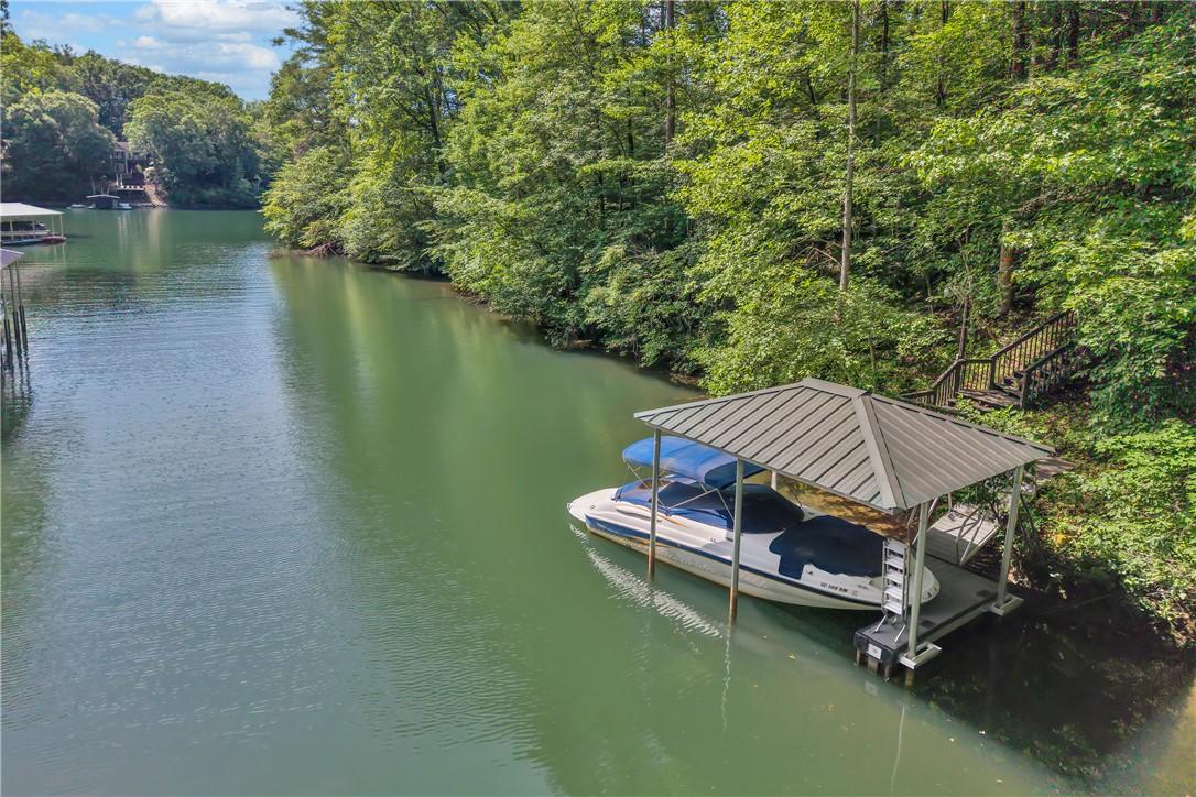 Image 3: Enjoy direct water access with a private boat dock