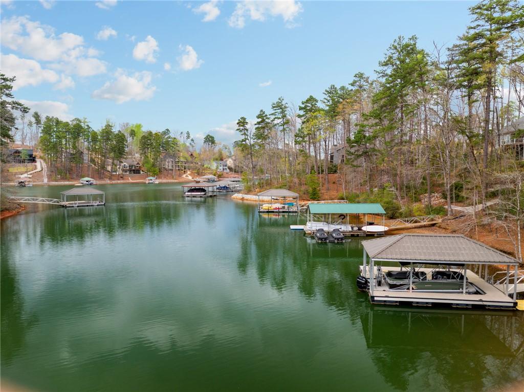 Image 2: This serene waterfront property boasts direct lake