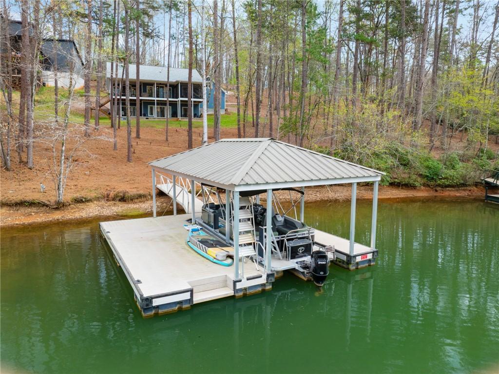 Image 3: This serene lakeside property offers direct water
