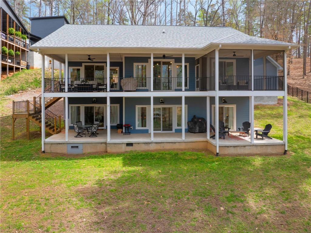 Image 4: This residence offers multi-level outdoor living w