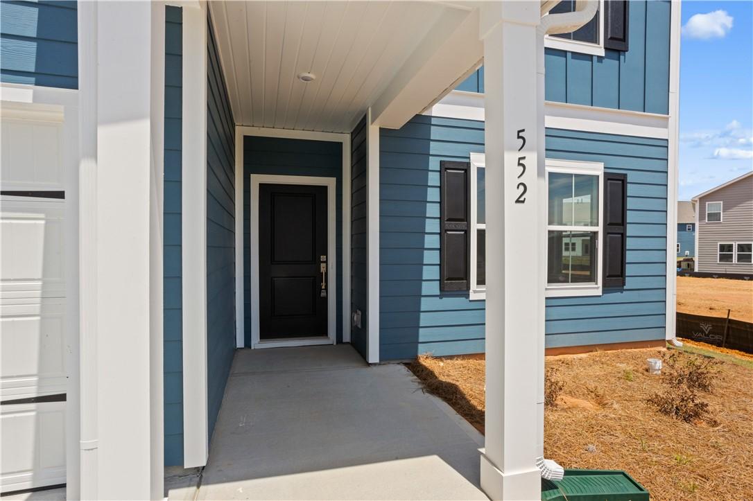Image 3: A welcoming covered entry invites you into this ch