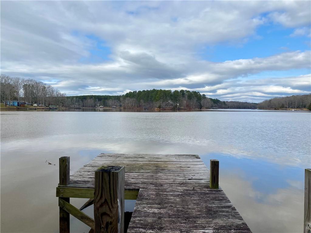 Image 1: This tranquil waterfront setting offers direct acc