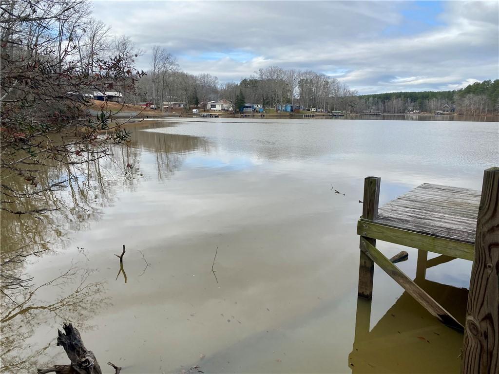 Image 3: This tranquil waterfront property features a sturd