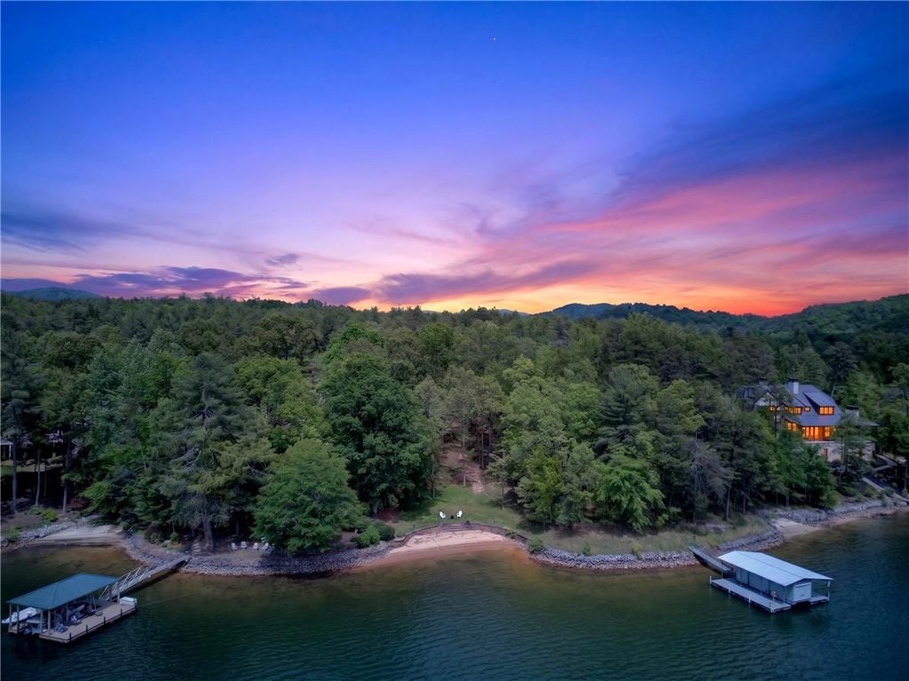 Image 2: This captivating lakefront property offers serene