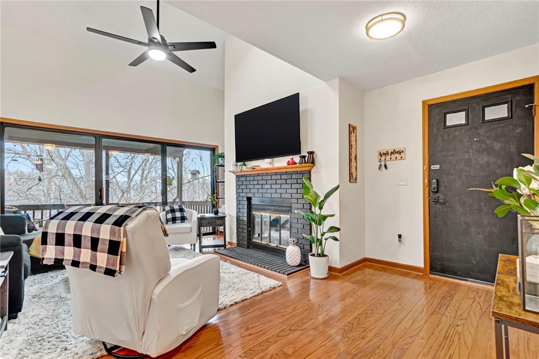 Image 3: This inviting living space features high ceilings,